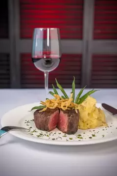 Steak dinner on a cruise ship.