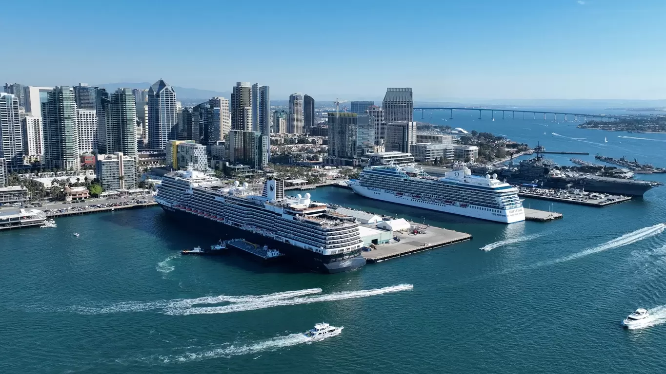 San Diego travel agents - cruise ships with San Diego skyline in background